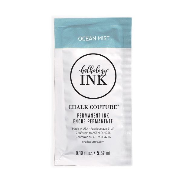 A packet of Chalk Couture Ink in the color “Ocean Mist,” labeled as permanent ink. The packet has a blue top section and white bottom section, with text in English and French, and product details at the bottom.
