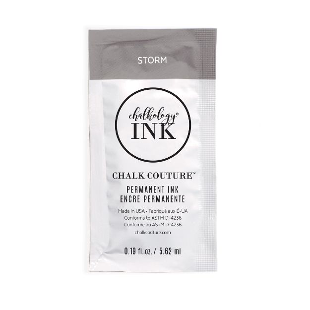 A silver packet labeled "Chalkology Ink" by Chalk Couture in the color "Storm." The packet contains 0.19 fl oz (5.62 ml) of permanent ink and features product information in English and French.