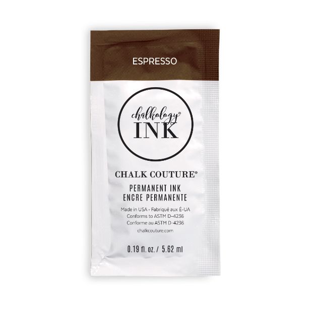 A single-use packet of Chalk Couture permanent ink in “Espresso” color, featuring brown and white packaging with product details and a circular logo on the front.