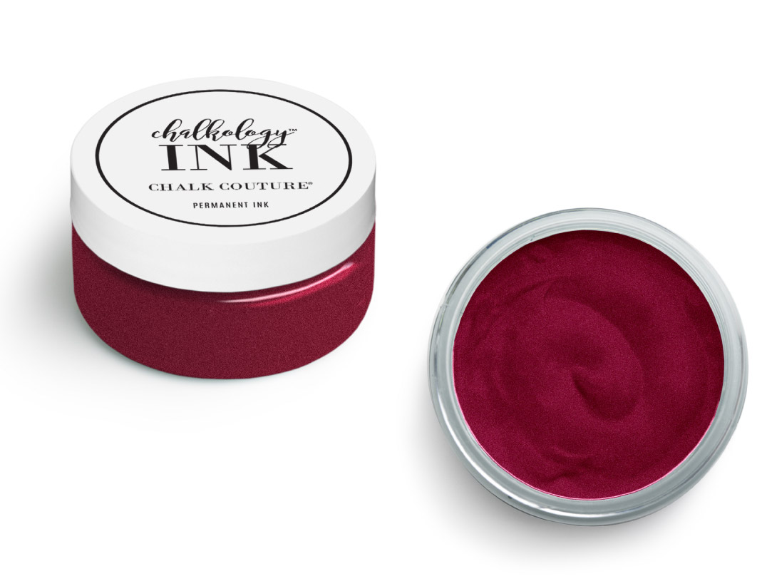 A small round jar of Chalkology Ink by Chalk Couture, filled with deep burgundy permanent ink. One jar is closed with a labeled lid, and the other is open showing the smooth, rich ink inside.