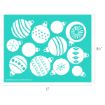 A teal rectangular stencil featuring various white Christmas ornament designs, including stripes, dots, and geometric patterns. The stencil measures 11 inches wide by 8.5 inches tall.