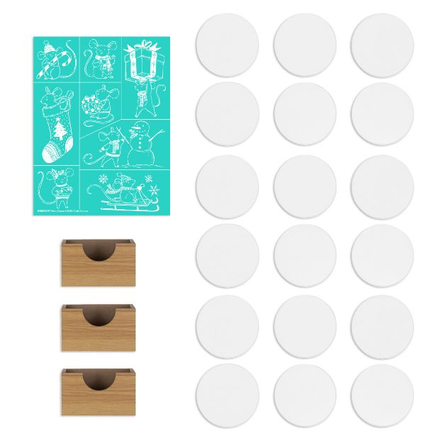 A set with a teal sheet of white holiday illustrations, 15 blank white circular discs arranged in a grid, and three small wooden holders placed below the discs.