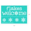 A teal sign with white text reading "flakes welcome," where the "o" in "welcome" is a snowflake. Below are four different white snowflake designs in a row. Dimensions are 6½ inches by 4½ inches.