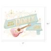 A pastel illustration of a pink acoustic guitar with a blue ribbon that reads "What would Dolly do?" in yellow letters, surrounded by decorative swirls. Image dimensions are 11 by 8.5 inches.