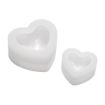 Two white, heart-shaped silicone molds of different sizes are shown on a plain white background. The molds have smooth edges and are nested, each with a hollow center.