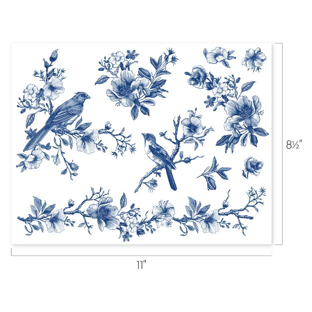 Blue and white illustration of two birds perched on flowering branches, surrounded by various detailed floral and leaf designs. The image measures 11 inches wide by 8.5 inches tall.