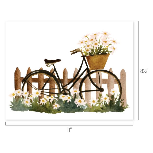 A watercolor illustration of a vintage bicycle with a basket of white daisies, leaning against a wooden picket fence, with grass and flowers in the foreground. Dimensions: 11 inches wide by 8.5 inches tall.