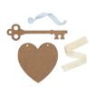 A flat lay of a brown wooden heart, a matching wooden key, a light blue ribbon with a pom-pom, and a piece of cream lace ribbon on a white background.