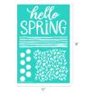A teal stencil sheet with the words "hello SPRING," several horizontal lines, six solid circles, and a section of tulip shapes. The sheet measures 12 inches wide by 18 inches tall.