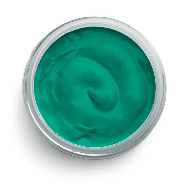A top-down view of an open container filled with smooth, teal-colored cream or gel. The contents have a glossy texture and a slight swirl pattern on the surface.