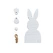 Wooden bunny silhouette with two separate paw pieces, a small white ball, and a loop of twine arranged neatly on a white background.