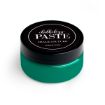 A round container of Chalk Couture Chalkology Paste with a black lid and vibrant teal paste inside, labeled "washable paste" on the lid, set against a white background.