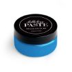 A round container of Chalkology Paste by Chalk Couture with a black lid and bright blue paste inside, labeled as washable paste. The container is on a white background.