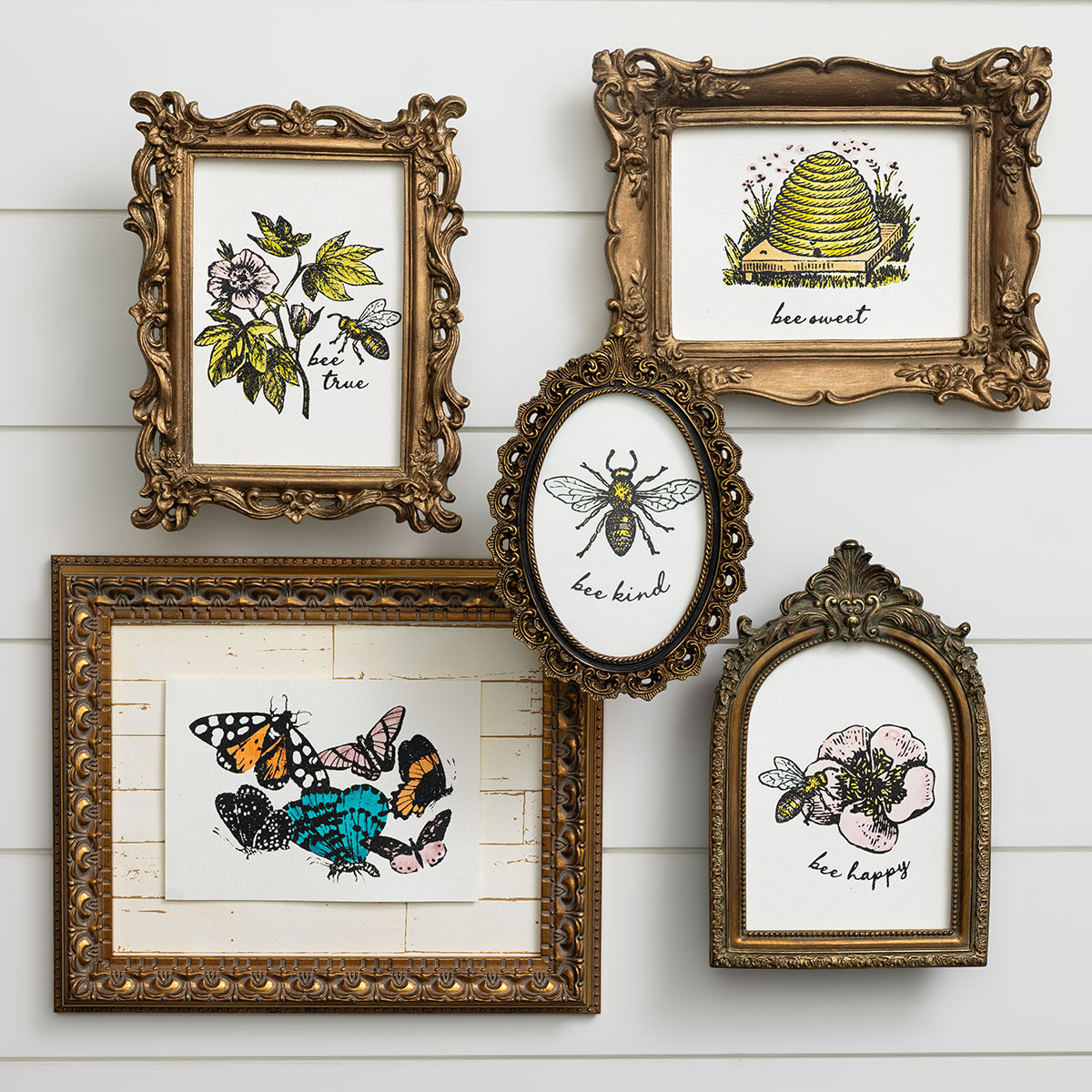 Five vintage-style framed illustrations with positive bee-themed messages, including bees, a beehive, flowers, and butterflies, each paired with phrases like “be true,” “bee sweet,” “bee kind,” and “bee happy.”.