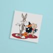 A square print featuring cartoon characters Bugs Bunny, Daffy Duck, and Porky Pig standing together, placed on a light blue background.