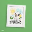 Framed artwork featuring Snoopy holding flowers, standing under a sun, clouds, and raindrops with the text “spring has SPRUNG” on a green wall.