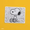 A white mat featuring a black and white illustration of Snoopy sitting, surrounded by comic-style doodles and exclamations like “BONK!”, “NO!”, and “GOOD GRIEF!” on a yellow background.