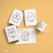 Flat lay of Winnie the Pooh-themed stationery and accessories, including a mug, notebooks, and a pouch. Each item features a character illustration (Pooh, Piglet, Tigger, Eeyore) with encouraging handwritten quotes.