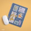 A blue mouse pad features Winnie the Pooh characters—Tigger, Pooh, Piglet, Eeyore, and a honey pot—drawn as postage stamps, next to a white Apple Magic Mouse on a yellow background.