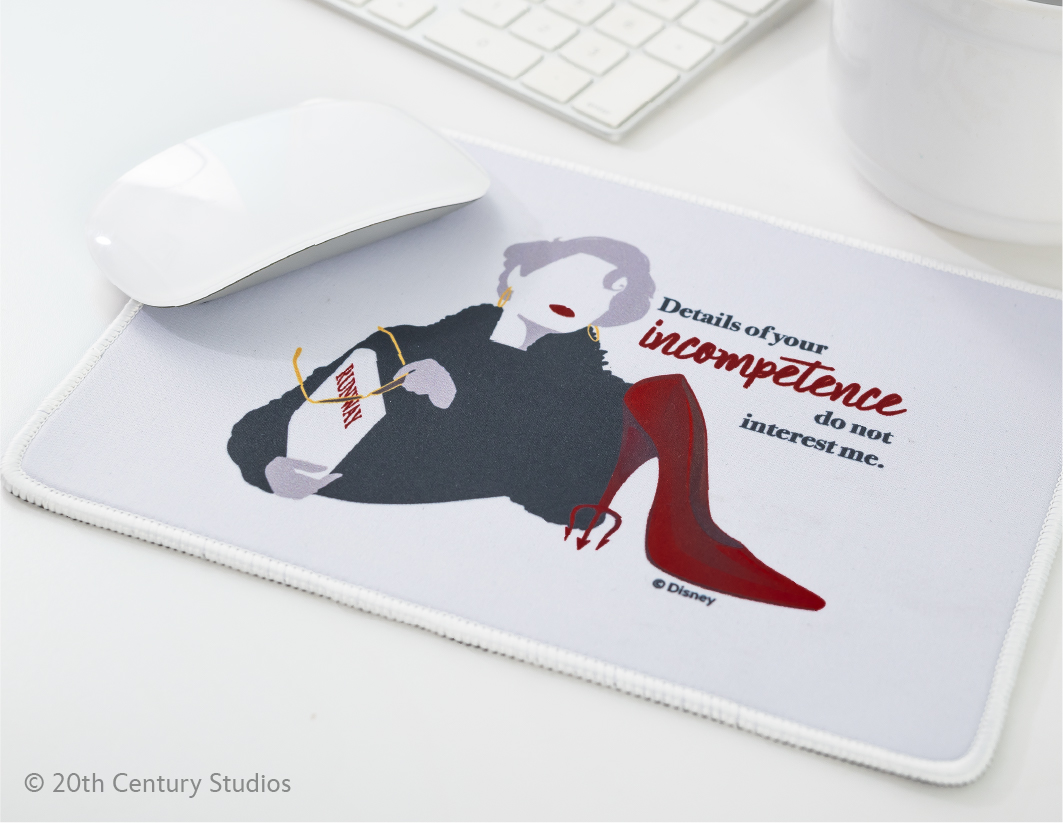 A mouse rests on a pad featuring an illustrated woman in a black dress and red heels with a notepad reading "INCOMPETENCE." The pad displays the quote: "Details of your incompetence do not interest me.