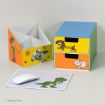 Colorful desk organizers and a mouse pad featuring Toy Story characters Woody, Buzz Lightyear, Slinky Dog, Hamm, and Rex, with a white mouse on the pad. © Disney/Pixar.