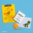 A yellow clipboard with Woody from Toy Story, a spiral notebook with "To Infinity and Beyond" text, a pencil, an orange sticky note, and a white mouse pad with Rex the dinosaur on a blue background.
