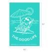 An illustration of Snoopy relaxing on a beach chair under an umbrella by the sea, with a sun in the background. Text below reads “THE GOOD LIFE.” Dimensions of the image are 6½" by 4½".