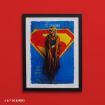 Framed artwork featuring a woman in a long brown coat and boots standing confidently before a large Supergirl emblem on a blue background, with the words "TRUTH. JUSTICE. WHATEVER." on the left.