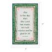 A decorative sign with a green floral border and scalloped edges displays the Bible verse: "This is the day that the Lord has made. We will rejoice and be glad in it! Psalm 118:24." Size: 17" x 11".