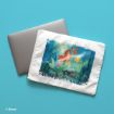 A white laptop sleeve with an illustration of Ariel, Sebastian, and Flounder from Disney's The Little Mermaid lies on top of a silver laptop against a light blue background.