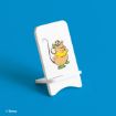 A white phone stand displays an illustration of Gus, the mouse from Disney’s Cinderella, wearing a yellow shirt, green hat, gloves, and shoes, set against a bright blue background.