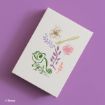 A canvas on a purple background features Disney's Pascal the chameleon, a paintbrush, a flower, leaves, and a brown swirl design, all in pastel colors. Disney copyright is shown at the bottom left.