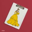 A white clipboard with a hand-painted illustration of Belle from Disney’s "Beauty and the Beast," wearing a yellow gown, is placed on a red background.