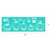 A teal stencil sheet, 18 inches by 6 inches, featuring white outlines of five pumpkins and three different jack-o’-lantern face designs above them.