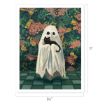 A figure draped in a white sheet with black eye holes stands holding a black cat. The background is a floral patterned wall with green leaves and flowers. The floor is tiled. Dimensions: 8.5 inches wide by 11 inches tall.