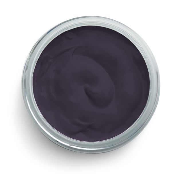 A round, open container filled with smooth, dark purple cream or gel, viewed from above against a white background.