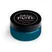 A round jar of Chalkology Chalk Couture paste with a teal body and a black lid labeled "Chalkology Paste Chalk Couture Washable Paste," placed on a white background.