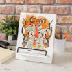 A tablet stand displays Halloween art of Minnie and Mickey Mouse dressed as mummies, holding pumpkin buckets, with "BOO!" written above them. Office supplies and a small plant are on the desk nearby.