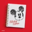 A white spiral notebook with a sketch of Mickey Mouse’s face and "Mickey Mouse" written in red on the cover, set on a red background.