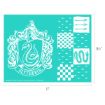 Turquoise stencil sheet with the Slytherin crest, snake, chessboard patterns, arrows, and small fish repeated. Dimensions are 11 inches by 8.5 inches.