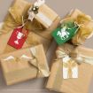 Four presents wrapped in brown paper and gold ribbons, each with tags featuring Harry Potter-themed designs: the Triwizard Cup, a hippogriff, the Golden Snitch, and Fawkes the phoenix.