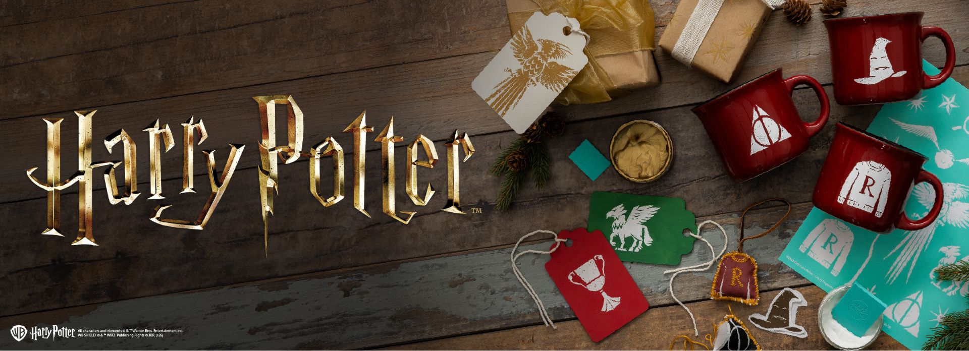 Harry Potter logo with holiday-themed items: red mugs, wrapped gifts, gift tags featuring magical symbols, and turquoise napkins with Hogwarts house letters. Festive, cozy scene with pinecones and ribbon.
