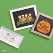 Three Peanuts-themed frames: one shows Charlie Brown characters in a pumpkin patch, one has text, “IT’S THE GREAT PUMPKIN CHARLIE BROWN” on a pumpkin, and the third has Snoopy and Lucy with “LAUGH!” on a white tray.