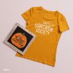A yellow T-shirt reading “The Sarcasm Society” with a Peanuts character, next to a framed sign featuring a pumpkin and the text “It’s the Great Pumpkin Charlie Brown.”.