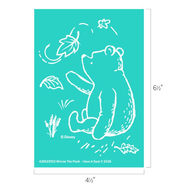 White outline of Winnie the Pooh sitting and reaching for a swirling leaf, surrounded by grass and leaves, on a teal background. Image dimensions are 6½ inches tall by 4½ inches wide.