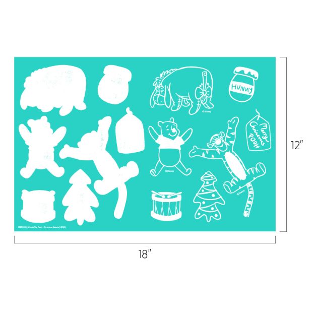 A turquoise stencil sheet featuring outlines of Winnie the Pooh characters, honey jars, Christmas items, and trees. The sheet measures 18 inches wide by 12 inches tall.