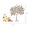 Winnie the Pooh pulls Piglet in a red wagon filled with apples under an apple tree. The image is 11 inches wide and 8.5 inches tall.