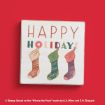 A festive sign reads “Happy Holidays” with three colorful stockings hanging below. The background is red.