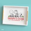 A tray features Charlie Brown, Sally, and Snoopy holding cocoa mugs. Text reads “Snoopy’s Cocoa with extra marshmallows” in red, with holly and stars, on a light blue background.