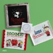Four Peanuts-themed holiday cards are displayed on a green background, featuring Snoopy, Charlie Brown, and other characters with festive messages like “Reindeer Crossing” and “A Charlie Brown Christmas.”.